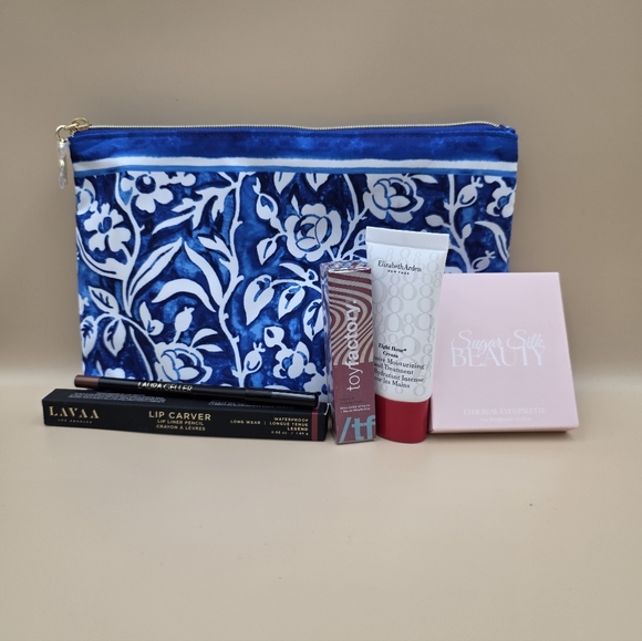 Estee Lauder Handbags - Estee Lauder Blue Floral Cosmetic Bag With Beauty Products